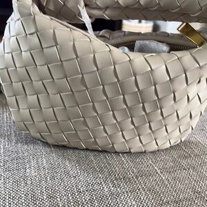 Elegant Cream Woven Leather Bag